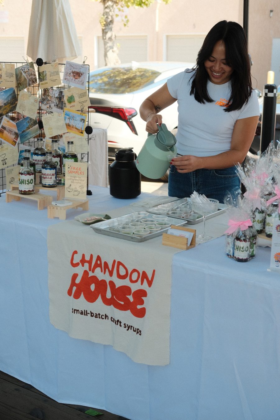 Founder pouring at pop-up